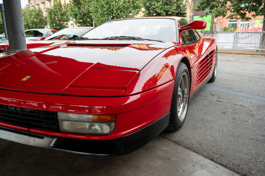 Mondov&igrave; (cuneo), italy, july 21, 2024. Ferrari rally. Red ferrari testarossa parked during a rally event, showcasing automotive luxury, italian design, and performance heritage