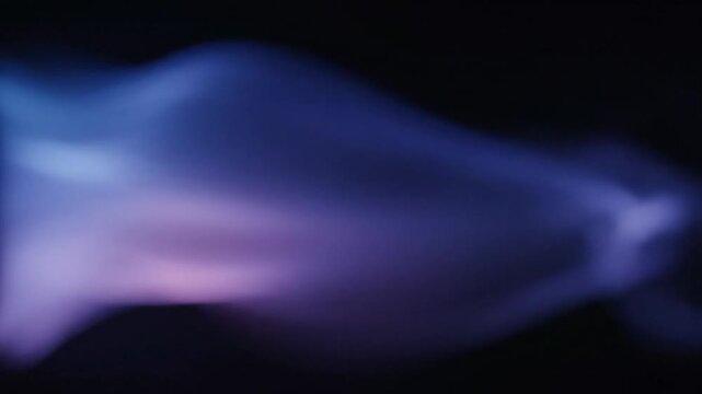 purple smoke waves on dark background