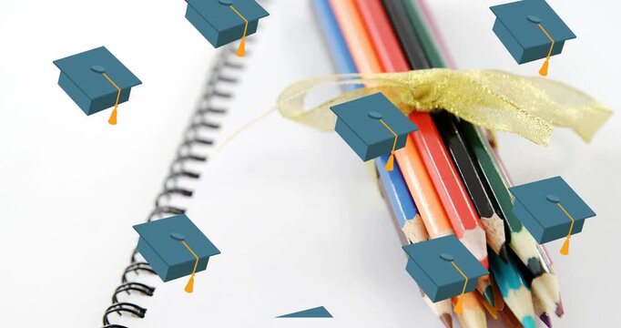 A bundle of colored pencils tied with a ribbon, with copy space