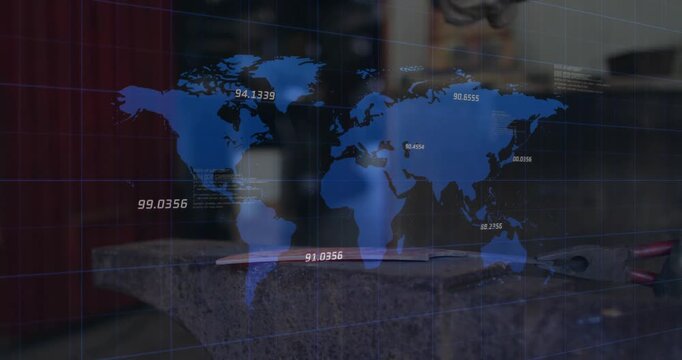 Metalworker inspecting sheet in workshop, showing blue digital world map gridlines and data labels