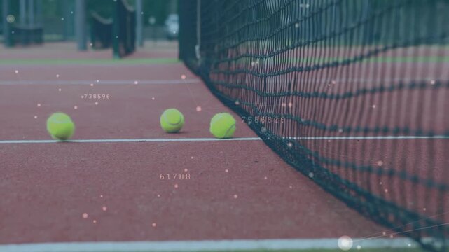 Three yellow tennis balls clustering near net, featuring floating data overlay on red court surface