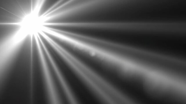 Brilliant Lens Flare with Bright White Light and Anamorphic Streaks on Black Background for Cinematic Overlays and Video Transitions.