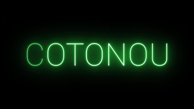 Flickering neon green glowing cotonou sign animated on black background