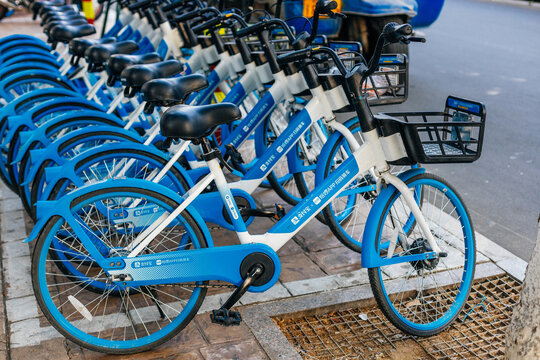 Jinan, China - June 27 ,2023: View of electric scooters, popular transport in China,  rental in Zhuji city  street