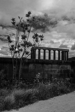 Edinburgh, Scotland: black and white, view of The National Monument of Scotland, memorial to Scottish soldiers and sailors who died fighting in the Napoleonic Wars dominating the top of Calton Hill