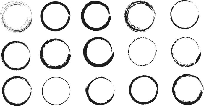 Collection of textured hand drawn circular brush strokes and black ink ring frames isolated on a white background.