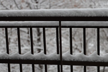 heavy snow collected on iron railings, uprights (macro, close-up, seasonal) © Don Hoskins