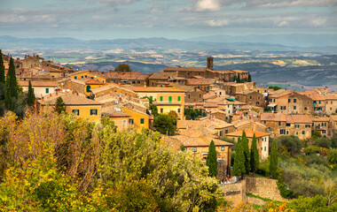 Fototapeta premium Montalcino hill town panorama with historic buildings and tuscan landscape, Italy.