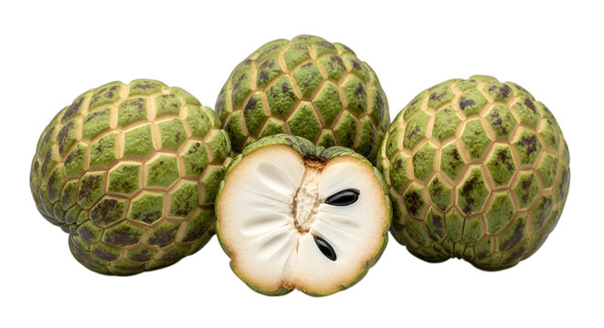 Green Custard Apples with One Sliced Open on Black Background