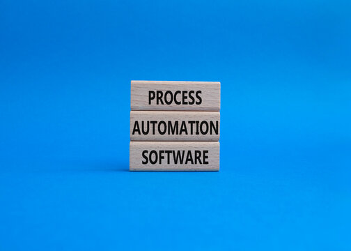 Process Automation Software symbol. Concept word Process Automation Software on wooden blocks. Beautiful blue background. Business and Process Automation Software. Copy space