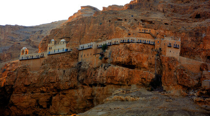 JERICHO ISRAEL: The Monastery of Saint George of Choziba is a Greek Orthodox monastery dramatically built into the cliff face of the Wadi Qelt, a scenic gorge between Jerusalem and Jericho.