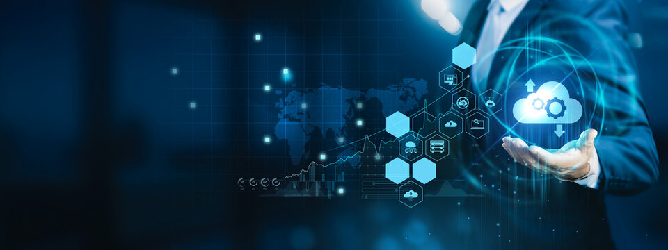 IT expert holding digital dashboard. Cloud Computing delivers scalable storage, servers, and applications through secure internet-based infrastructure.