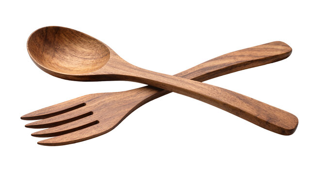 Natural brown wooden serving spoon and fork crossed, isolated on transparent background for kitchenware designs