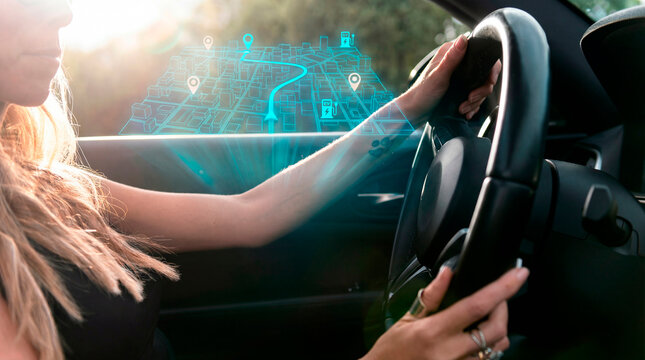 Focused woman planning route with smart city navigation hologram