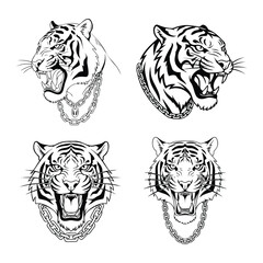 Fototapeta premium Set of tiger heads with chains, black and white vector illustrations