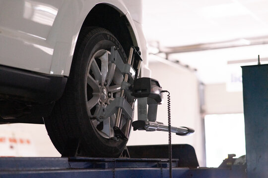 Car wheel alignment procedure in modern garage