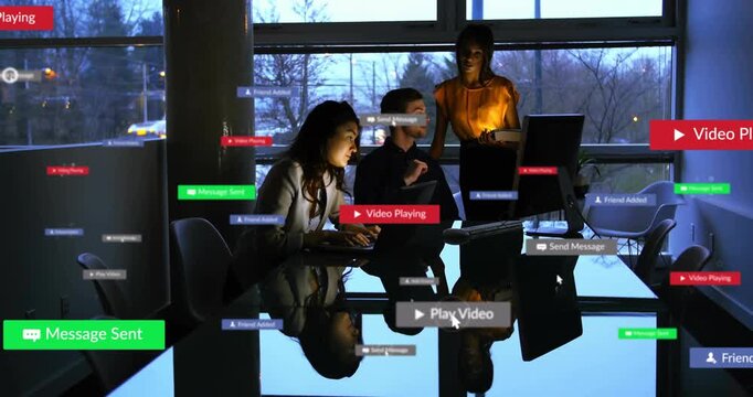 Team typing, tapping while badges popping up, piling over people, table, reviewing business media