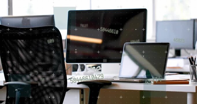 Vertical video: Shifting camera showing monitor and laptop at desk revealing pens with data overlay