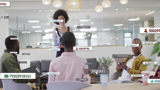 Vertical video: Talking woman in overalls holding folder leading team in lounge with tags appearing