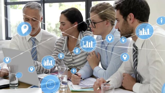 Lead pointing at laptop and peer using trackpad, sparking business charts linking team for decision