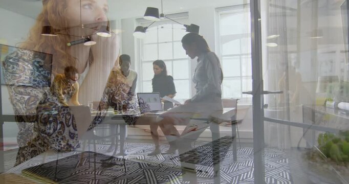 Team opening laptop, pointing and aligning business plan while red hair overlay appearing, noting