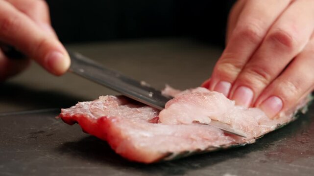 Cooking fish Peruvian ceviche close-up. Fresh cooked ceviche made of raw white fish. Traditional Peruvian cuisine. Cooking seafood dish.