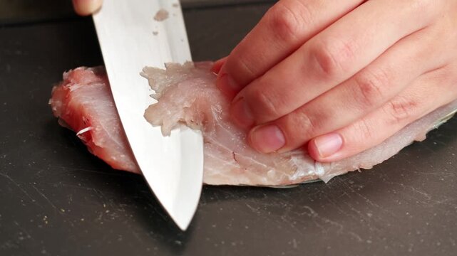 Cooking fish Peruvian ceviche close-up. Fresh cooked ceviche made of raw white fish. Traditional Peruvian cuisine. Cooking seafood dish.