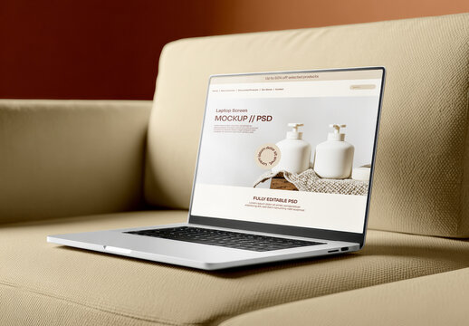 Laptop Mockup on Sofa Displaying Website