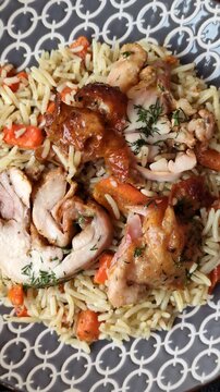 Kabsa or mandi, an Arabic dish with rice and chicken, salt, and spices. Kabsa or mandi as a food background for your design