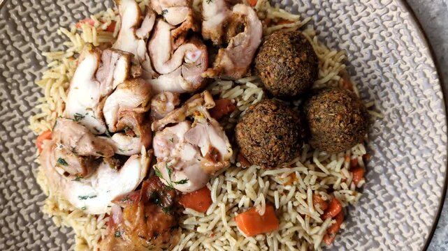 Kabsa or mandi, an Arabic dish with rice and chicken, salt, and spices. Kabsa or mandi as a food background for your design