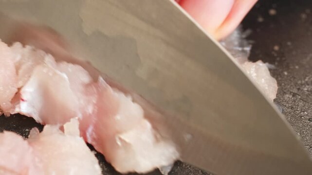 Cooking fish Peruvian ceviche close-up. Fresh cooked ceviche made of raw white fish. Traditional Peruvian cuisine. Cooking seafood dish.