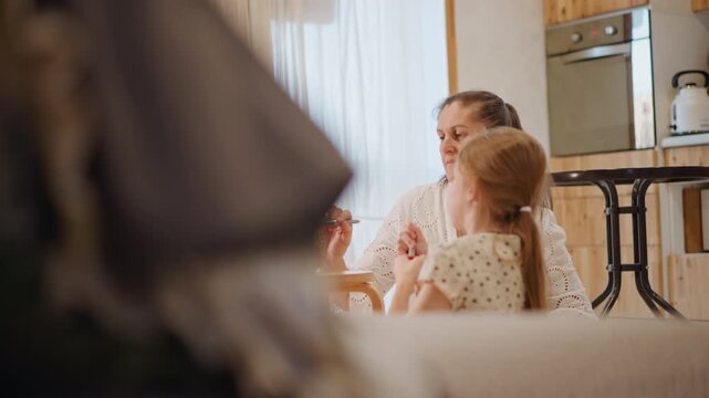 White mother daughter making pumpkin pie in warm kitchen with oven in background, soft sunlight, orange blanket on chair, hands shaping crust, gentle smiles, familial bonding, rustic autumn decor