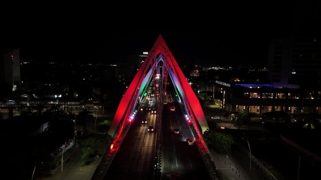 Cinematic drone shot of cable-stayed Matute Remus bridge in Guadalajara at sunset, urban transportation concept