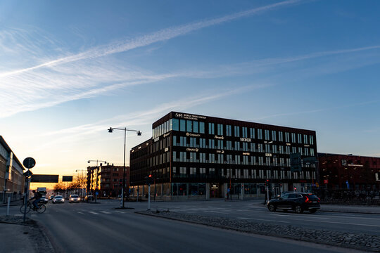 Northern Twilight: Modern Architecture of the World Trade Center Karlskrona Against a Streaking Sunset Sky