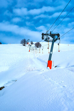 Skilift and ski slopes in the ski resort of Bielmonte (Biella Province, Piedmont, Northern Italy Alps).