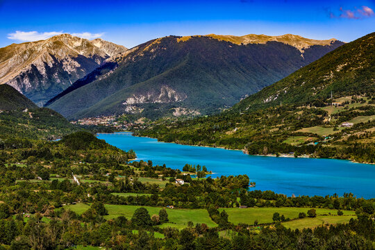 Lago di Barrea turquoise lake surrounded by mountains in Abruzzo
