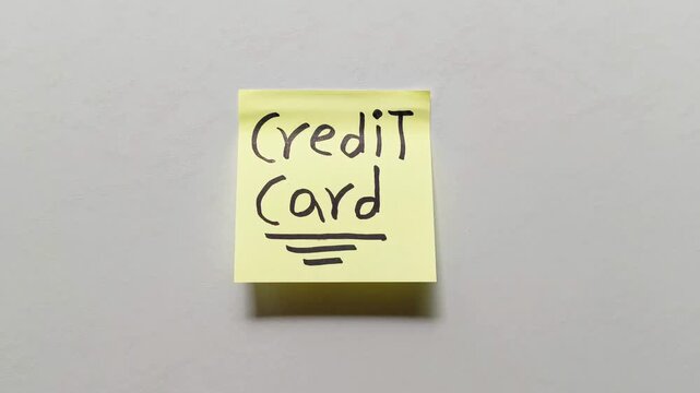 Credit card sticky note isolated on white background