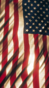 US American flag waving in the wind, seamless loop of United States national symbol for Fourth of July and patriotic concept.