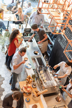 Bustling cafe with diverse patrons