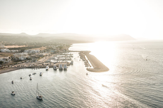 Latchi harbor and marina in Paphos, Cyprus with boats on sunlit sea