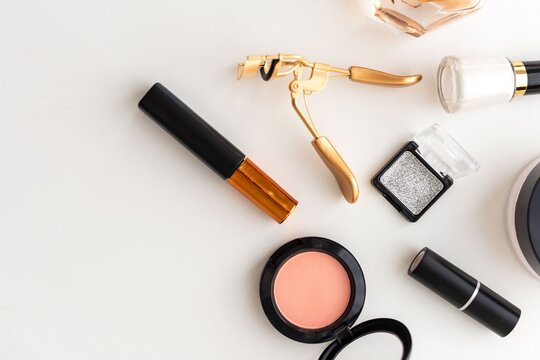 Elegant makeup essentials flatlay photo