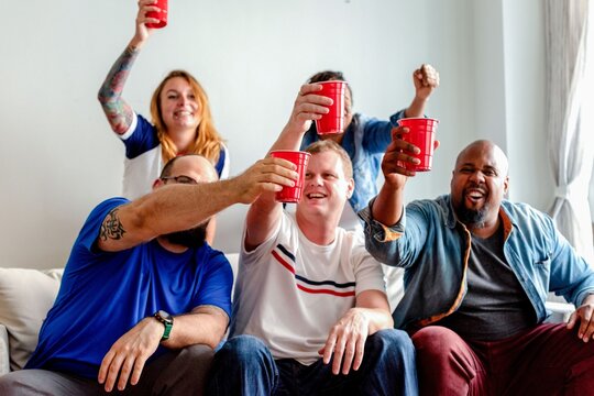 Friends celebrating with red cups