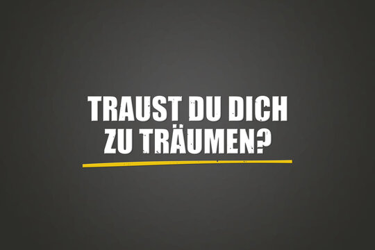 Traust du dich zu traeumen (Do you dare to dream?) - A blackboard with white text.