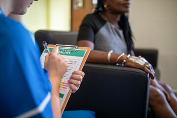 Healthcare consultation with patient.