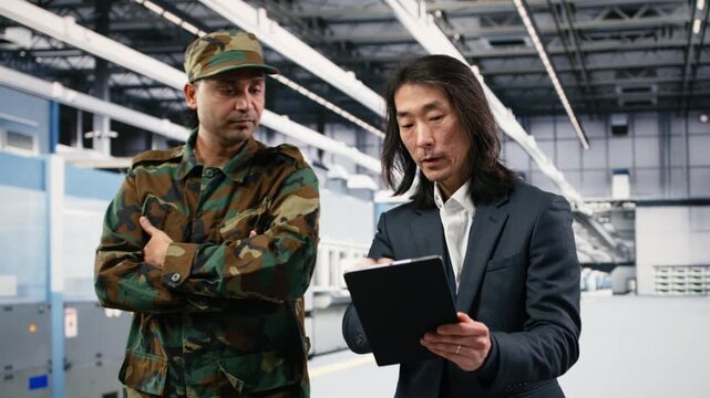 Military manufacturing microchips essential to national security during geopolitics technology race. Army increasing semiconductor self sufficiency to decrease defense vulnerabilities, camera B