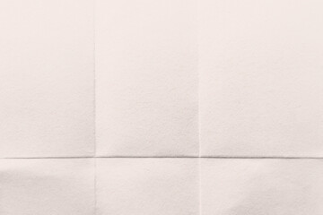 Fototapeta premium Textured folded paper background with copy space
