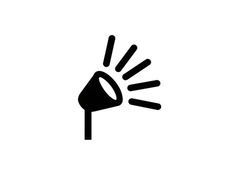 Isolated black graphic illustration of a modern spotlight emitting bright light rays