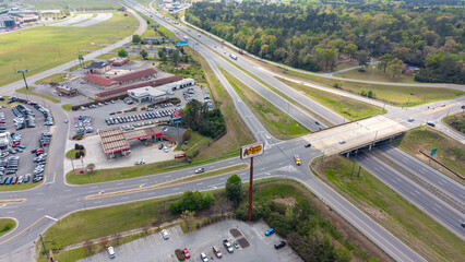 Naklejka premium Aerial shot of cars driving on the highway in Ashburn Georgia USA