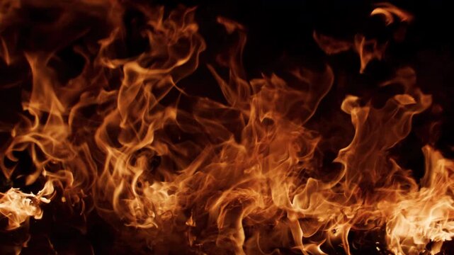 Fire blazing vivid firestorm. Fire burning realistic heat waves. Fire glowing fiery tones. Fire overlay background element.