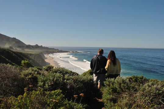 Man and woman arm and arm at Garrapata State Park at Big Sur, California